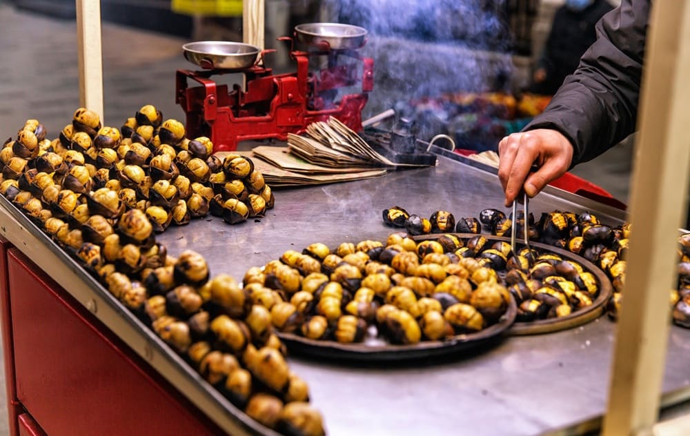 Traditional roasted chestnuts sold on the streets of Istanbul, part of the local food culture fans can enjoy during the 2026 UEFA Europa League Final