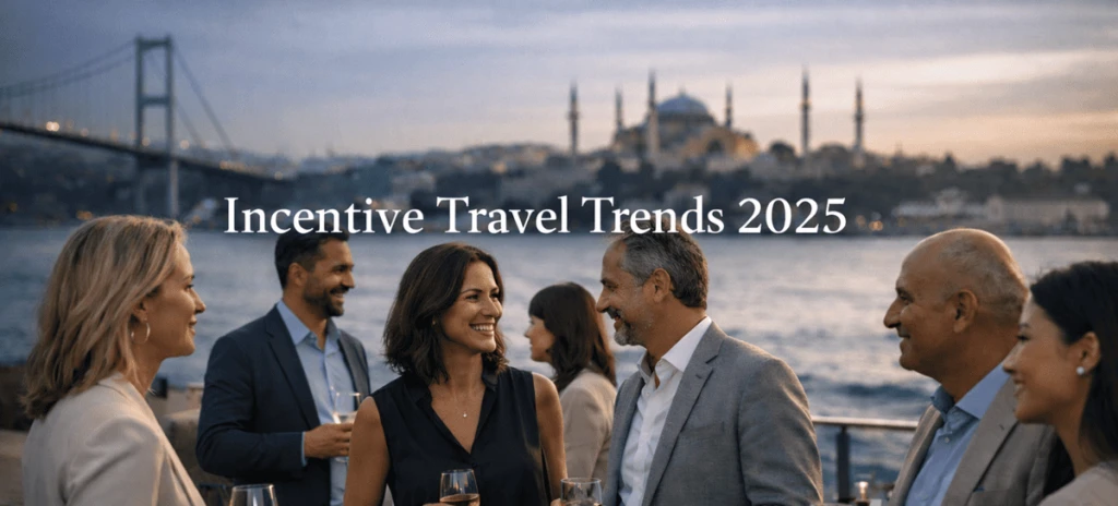 Istanbul Incentive Trends Business professionals networking on a Bosphorus cruise in Istanbul at sunset with skyline and mosques in the background, representing premium incentive travel trends in 2025.
